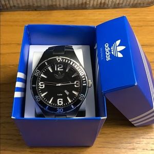 Adidas watch with date window